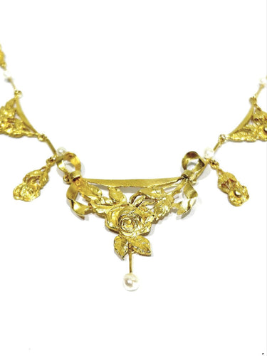 Collier drapé en or champagne et perles 58 Facettes 1809856