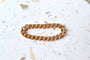 https://cdn.shopify.com/s/files/1/0963/7950/2920/files/bague-chaine-gourmette_e27749a0-7a33-4378-8358-b59340eba5e4.jpg?v=1779375780