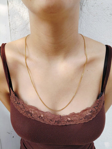 Chaîne gourmette en or jaune 18 carats 58 Facettes 1810206