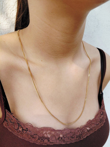Chaîne gourmette en or jaune 18 carats 58 Facettes 1810206