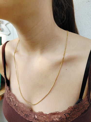 Chaîne gourmette en or jaune 18 carats 58 Facettes 1810206