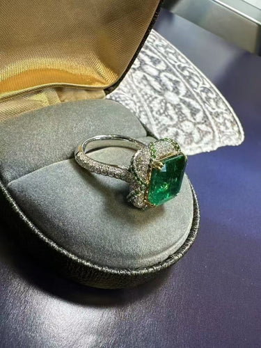 Bague 50 Bague en émeraude de Zambie, diamants et grenats tsavorites 58 Facettes jnci157