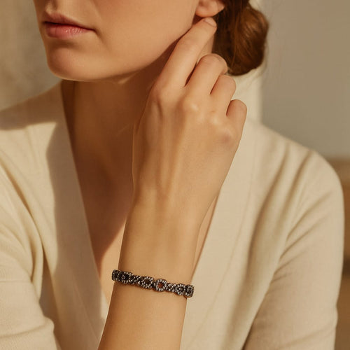 Repossi Caramelia - Bracelet en or noir et diamants 58 Facettes 62000245