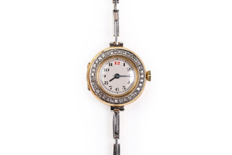 Marc Nicolet - Montre en or et platine avec diamants 58 Facettes 10037