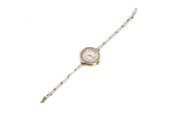 Marc Nicolet - Montre en or et platine avec diamants 58 Facettes 10037