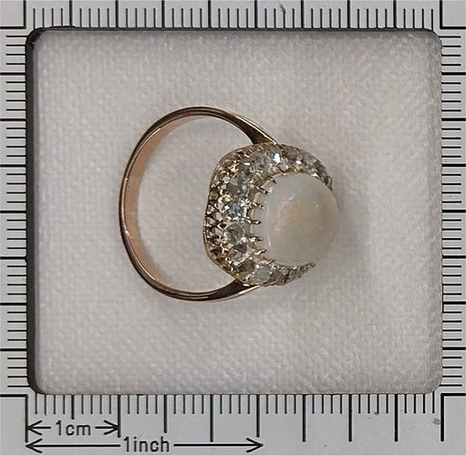 26089-0321.p12_A Late Victorian Opal Ring with Rose Cut Diamond Halo  circa 1880-en.jpg