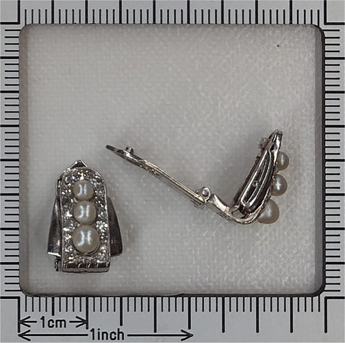 26177-0183.p05_Platinum Pearl and Diamond Earclips with Art Deco Echoes  circa 1950-en.jpg