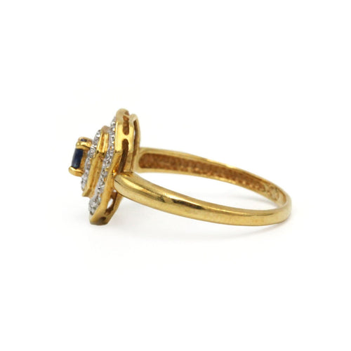 53 Bague en or jaune et blanc, diamants et saphir 58 Facettes 260216R