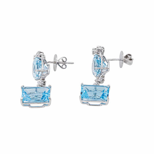 Boucles d'oreilles en or blanc, topazes bleues et diamants 58 Facettes 5867547RV