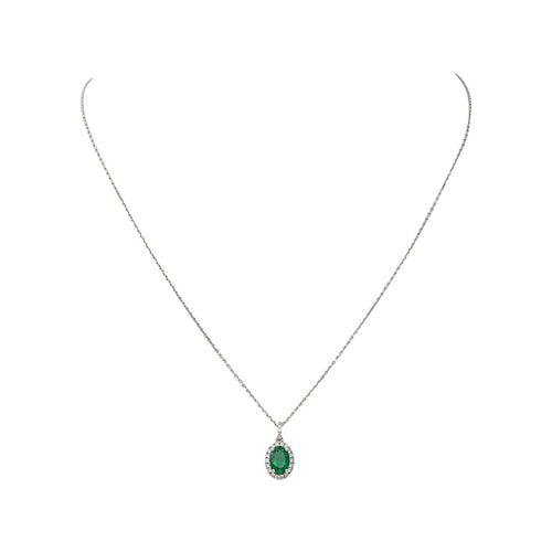Collier pendentif en or blanc, émeraude et diamants 58 Facettes 5943459RV