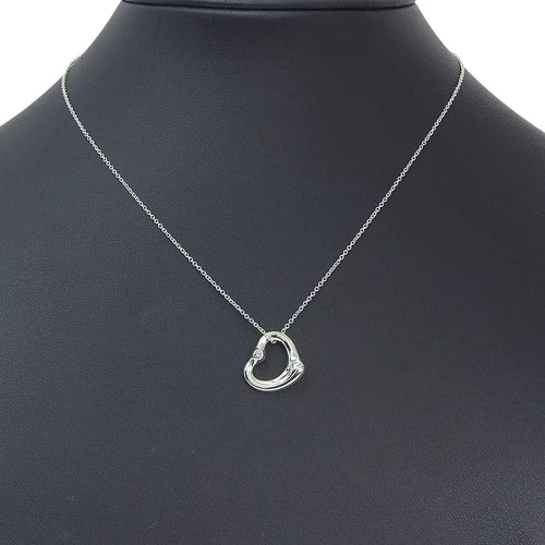 Tiffany & Co. Elsa Peretti - Pendentif Open Heart en argent et saphir rose 58 Facettes a92cws30t8