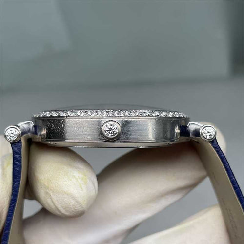 Van Cleef & Arpels Féerie - Montre Lady en or blanc et diamants 58 Facettes Jnci164