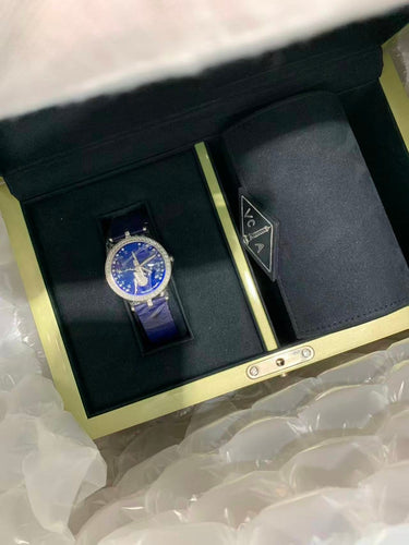Van Cleef & Arpels Féerie - Montre Lady en or blanc et diamants 58 Facettes Jnci164