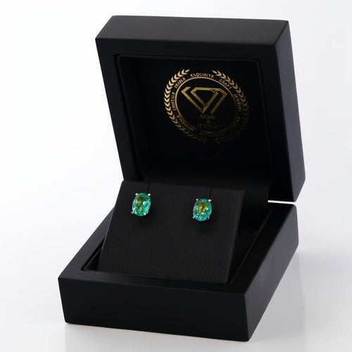 Boucles d'oreilles Boucles d'oreilles en or jaune 18 ct et émeraudes de Zambie 58 Facettes E0039
