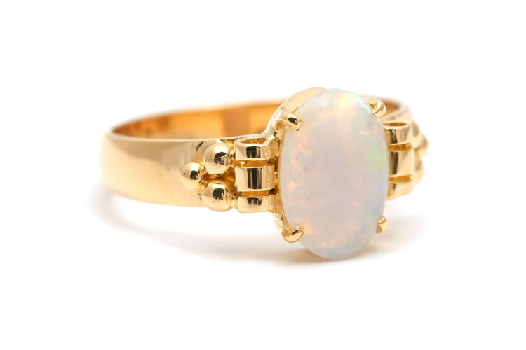 49 Bague contemporaine en or jaune 18 carats et opale 58 Facettes 23943