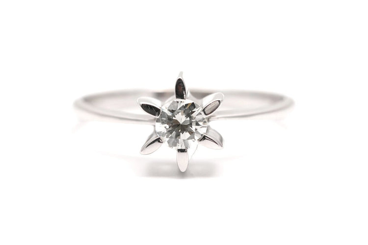 63 Années 70 - Bague en or blanc et diamant taille brillant 58 Facettes 23920