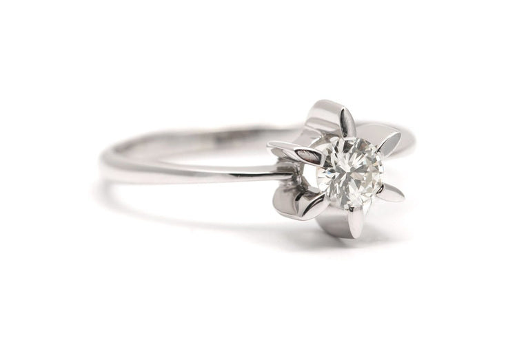 63 Années 70 - Bague en or blanc et diamant taille brillant 58 Facettes 23920