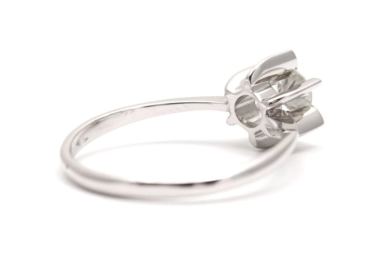 63 Années 70 - Bague en or blanc et diamant taille brillant 58 Facettes 23920