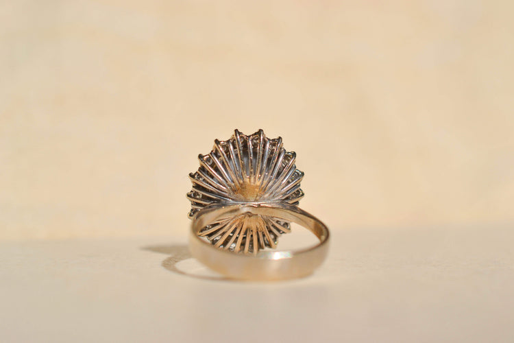 https://cdn.shopify.com/s/files/1/0963/7950/2920/files/bague-marguerite-or-blanc_099c09eb-015d-4ca3-b617-0c9f1905b5a2.jpg?v=1787746789