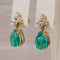 Boucles d'oreilles Boucles d'oreilles pendantes en or jaune 14 ct, émeraudes et diamants 58 Facettes E0043