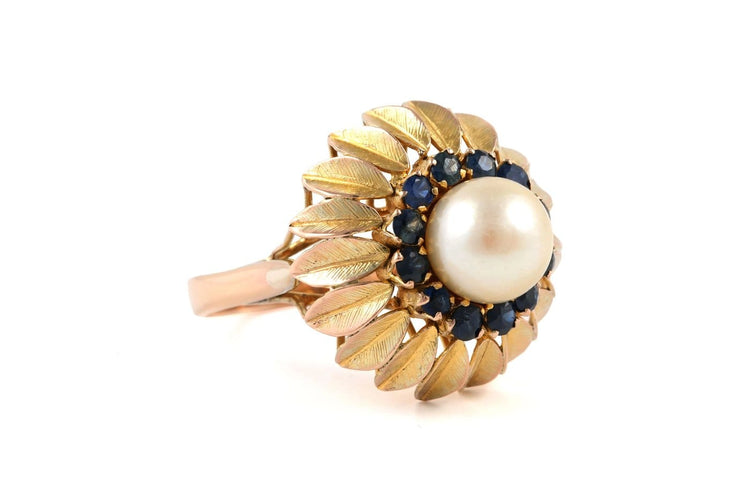 Bague 56 Bague années 50 en or jaune, perle et saphirs 58 Facettes 23900