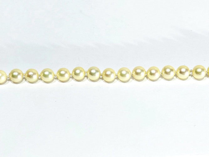 Collier de perles en or blanc et saphir 58 Facettes 1812785
