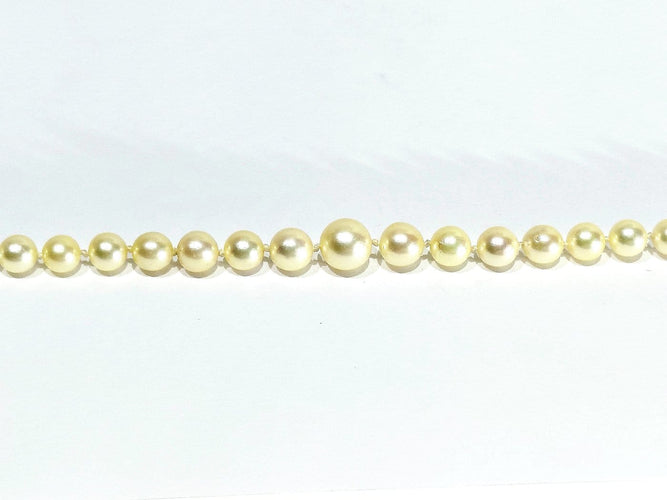 Collier de perles en or blanc et saphir 58 Facettes 1812785