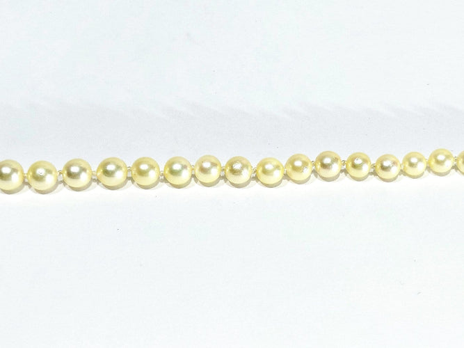 Collier de perles en or blanc et saphir 58 Facettes 1812785