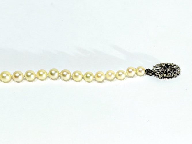 Collier de perles en or blanc et saphir 58 Facettes 1812785