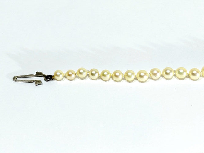Collier de perles en or blanc et saphir 58 Facettes 1812785
