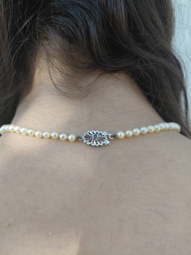 Collier de perles en or blanc et saphir 58 Facettes 1812785