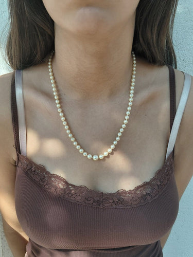 Collier de perles en or blanc et saphir 58 Facettes 1812785