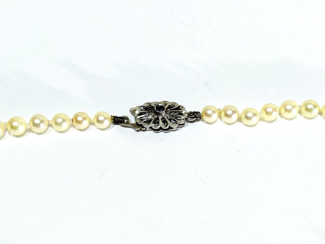 Collier de perles en or blanc et saphir 58 Facettes 1812785