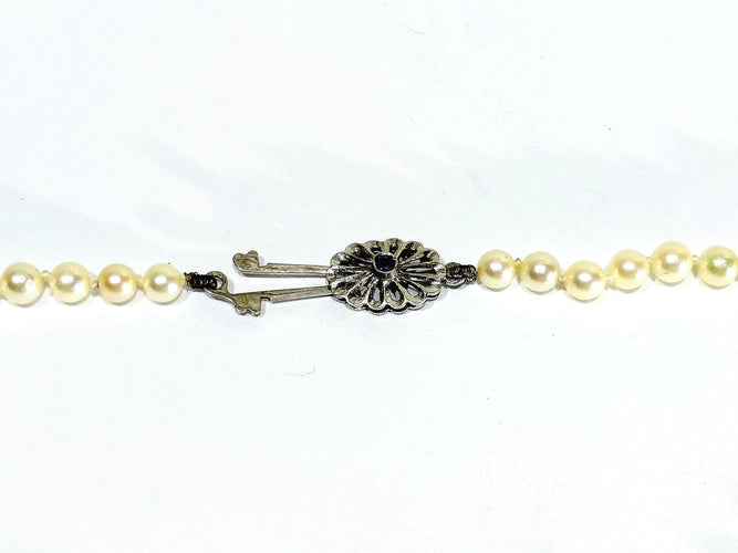 Collier de perles en or blanc et saphir 58 Facettes 1812785
