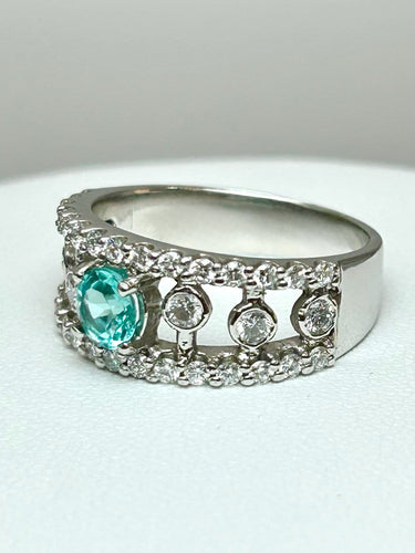 55 Bague en or blanc 18k avec tourmaline Paraíba et diamants 58 Facettes ANELLO ROUND PARAIBA