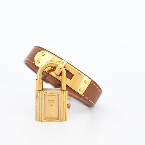 Hermès Kelly - Montre acier plaqué or cadran champagne 58 Facettes 576