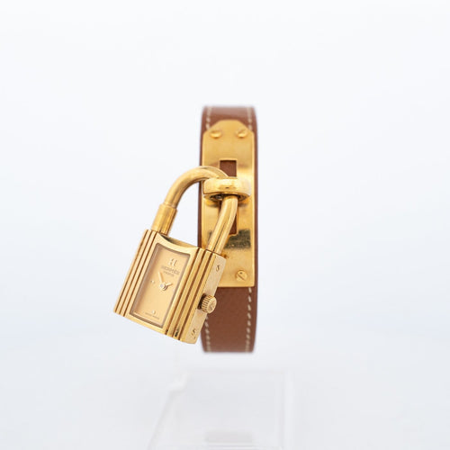 Hermès Kelly - Montre acier plaqué or cadran champagne 58 Facettes 576