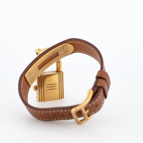 Hermès Kelly - Montre acier plaqué or cadran champagne 58 Facettes 576