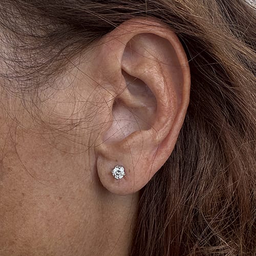 Boucles d'oreilles puces en or blanc et diamants 0,46 ct 58 Facettes 122