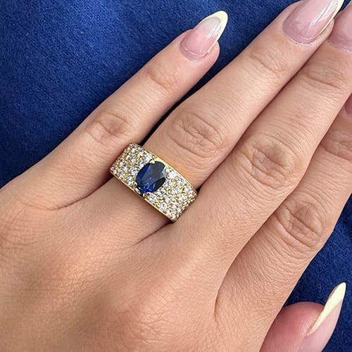 56 Bague bandeau en or jaune 18 ct, saphir et diamants 58 Facettes 14079