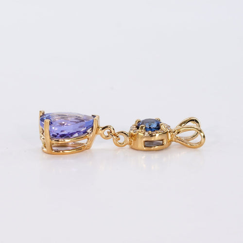 Pendentif Pendentif en or jaune 14 ct, tanzanite, saphir et diamants 58 Facettes P0011