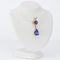 Pendentif Pendentif en or jaune 14 ct, tanzanite, saphir et diamants 58 Facettes P0011