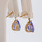Boucles d'oreilles en or jaune 14 ct, tanzanites certifiées et saphirs 58 Facettes E0047