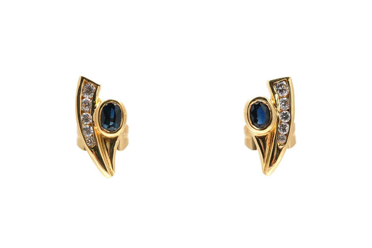 Boucles d'oreilles Boucles d'oreilles contemporaines en or jaune, saphirs et diamants 58 Facettes B914