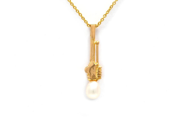 Pendentif Pendentif années 70 en or jaune 18 carats et perle 58 Facettes 23909