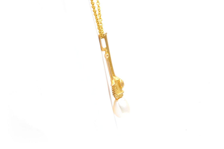 Pendentif Pendentif années 70 en or jaune 18 carats et perle 58 Facettes 23909