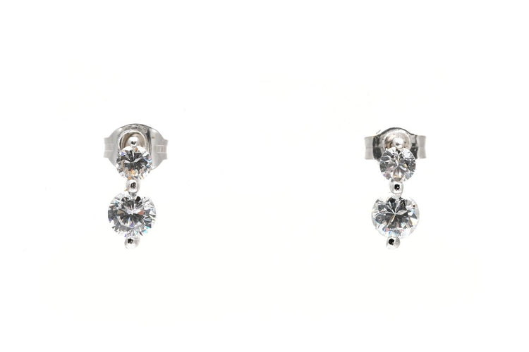 Boucles d'oreilles contemporaines en or blanc 18 carats serties de zirconiums 58 Facettes 23960