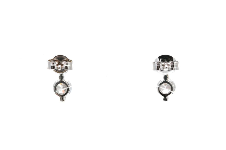 Boucles d'oreilles contemporaines en or blanc 18 carats serties de zirconiums 58 Facettes 23960
