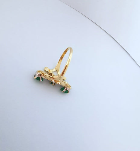 56.5 Bague marquise en or jaune et blanc 18K, émeraudes et diamants 58 Facettes 1796