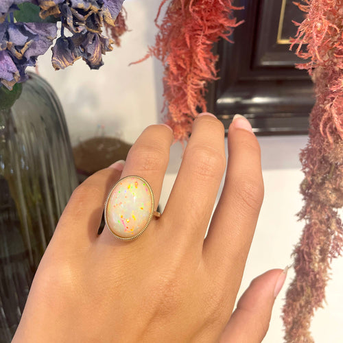 Bague 54 Bague solitaire en or jaune 14k avec opale Welo 58 Facettes E7D9071E60A945E18E1D824B2687FDBA